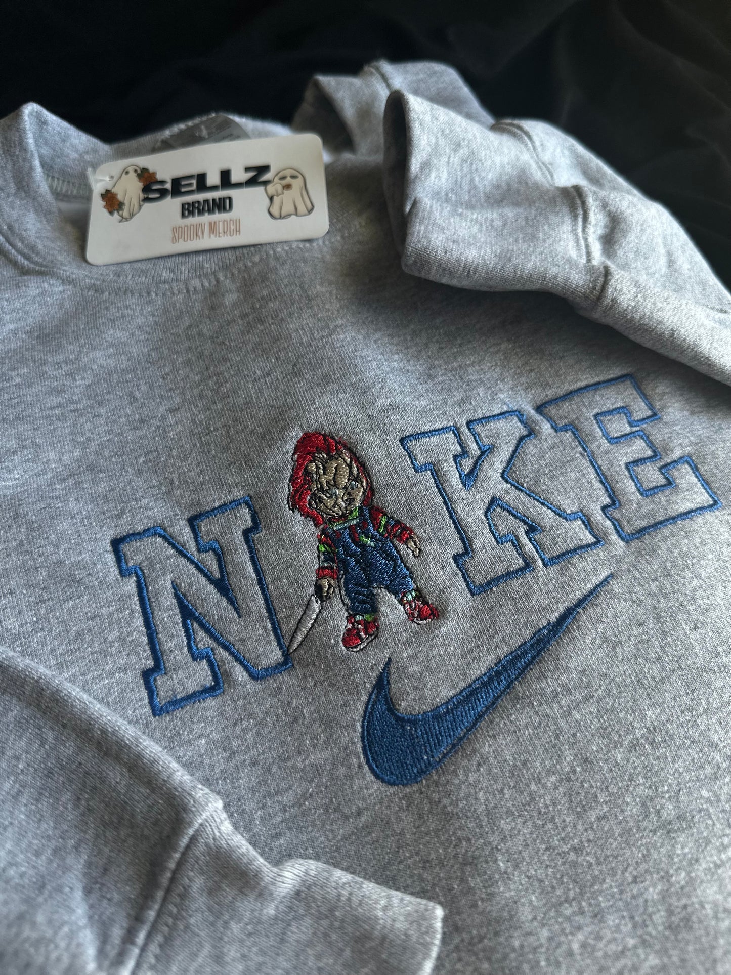 CHUCKY SWOOSH SWEATER